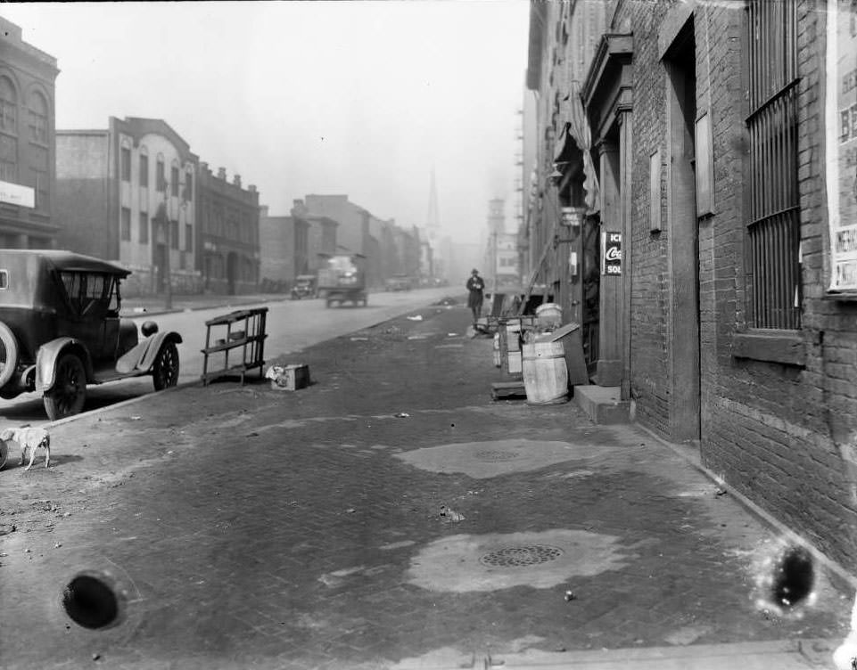#173 Centenary Methodist Church steeple visible at the north down 16th Street at approximately Walnut Street, 1930