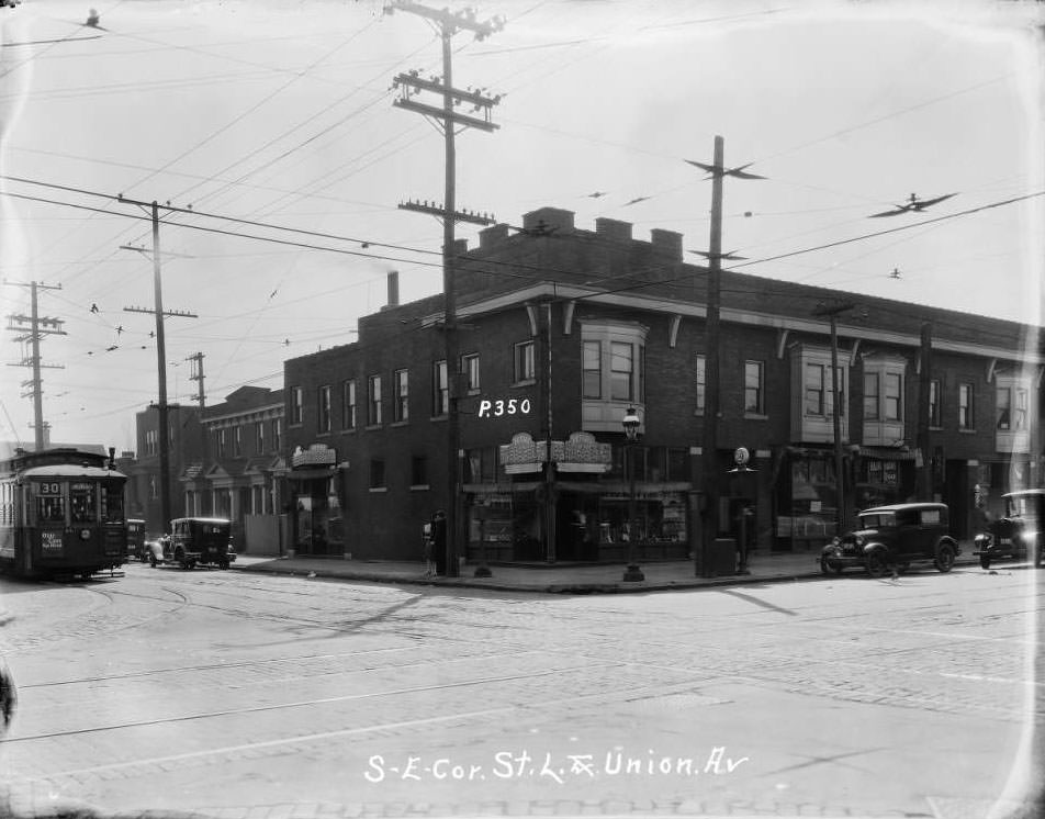 #41 Large commercial building at Union and St. Louis Avenues, home to Peters Shoes and Mound City Restaurant, 1930