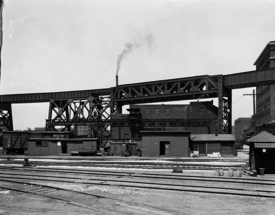 #192 View of railyard building and trestle. Near Chouteau Ave, 1930