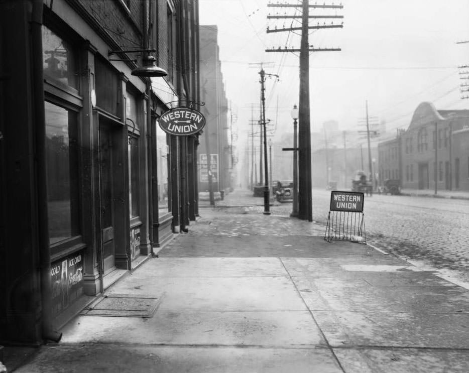 #206 View of North Broadway and Monroe Street. Western Union office at 2221 N. Broadway visible, 1930