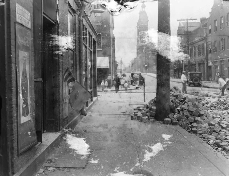 #2 View of N. 10th St. and Biddle, with the spire of Shrine of St. Joseph visible in the background, 1930