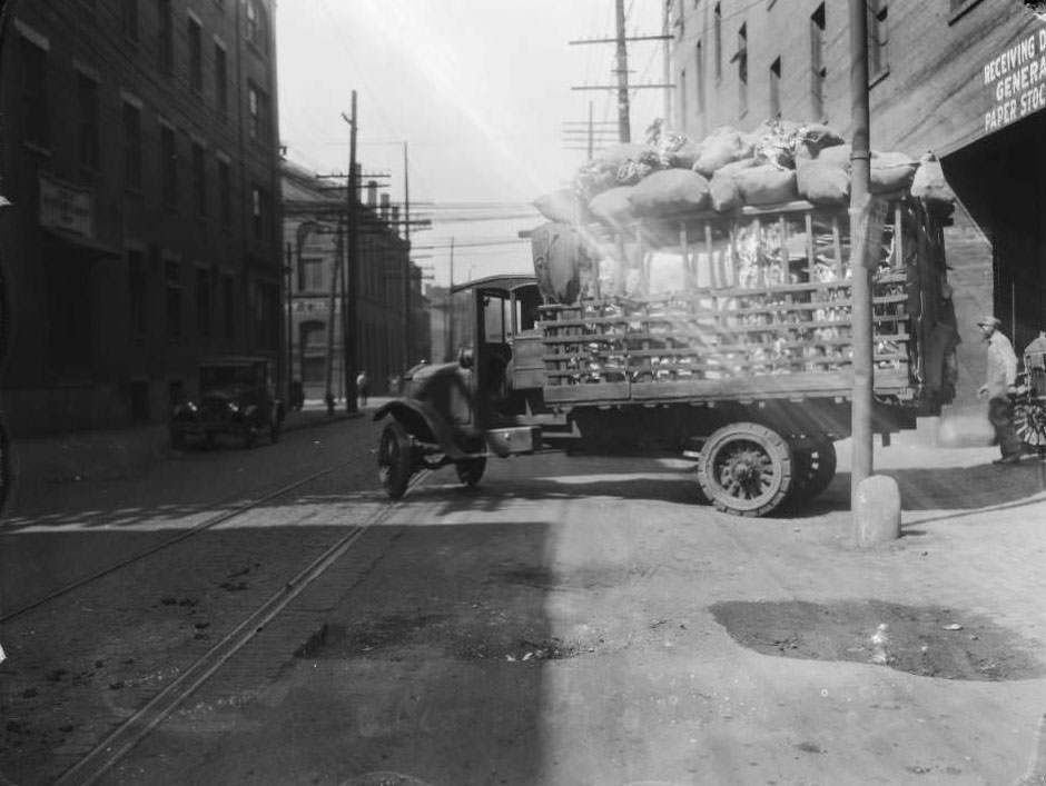 #26 View looking west on Carr Street at the intersection with North Seventh Street, with General Paper Stock Co. and V. Viviano & Bros. Macaroni Factory visible, 1931
