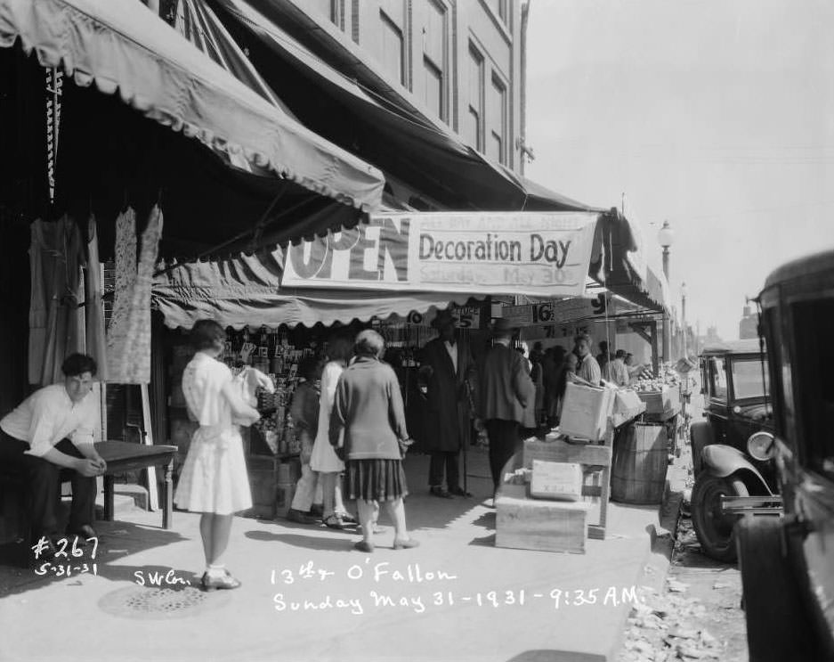 #76 Intersection at the southwest corner of 13th and O’Fallon Streets, view of buildings and streets, 1931