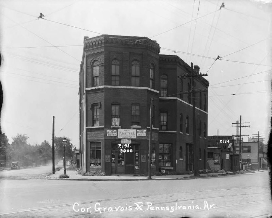 #81 Three-story brick commercial and residential building that stood at 3000 Gravois with a grocery store on the first floor, 1930