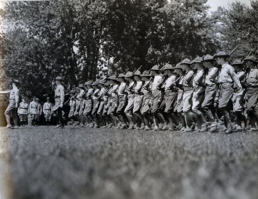 #124 C.M.T.C. youths at Jefferson Barracks wear army hoonail shoes, 1930.
