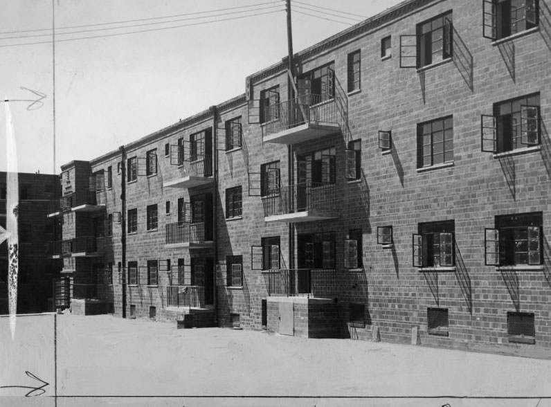 #130 Wing of Neighborhood Gardens Apartments, where rents are low, 1935.