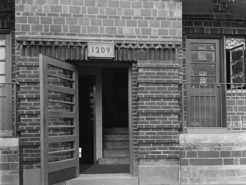 #131 Main entrance of Neighborhood Gardens Apartments, 1930.