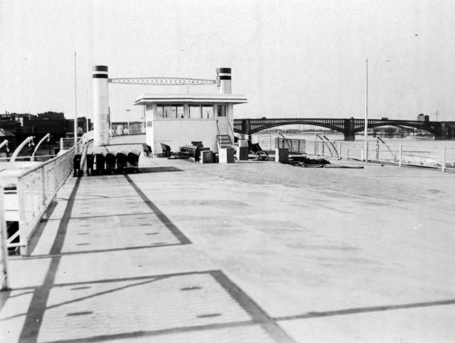 #171 The President steamboat’s fifth deck with a view of the Eads Bridge in the background, 1930