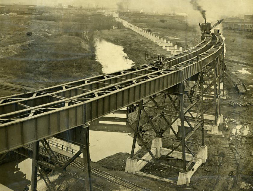 #206 Construction of the new northeast approach to the St. Louis Municipal Bridge, now known as the MacArthur Bridge, 1930