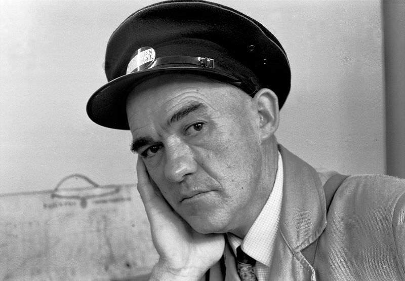 #22 Mentally preparing for the last trip of the day, in the staff rest room in Paignton bus station, 1970