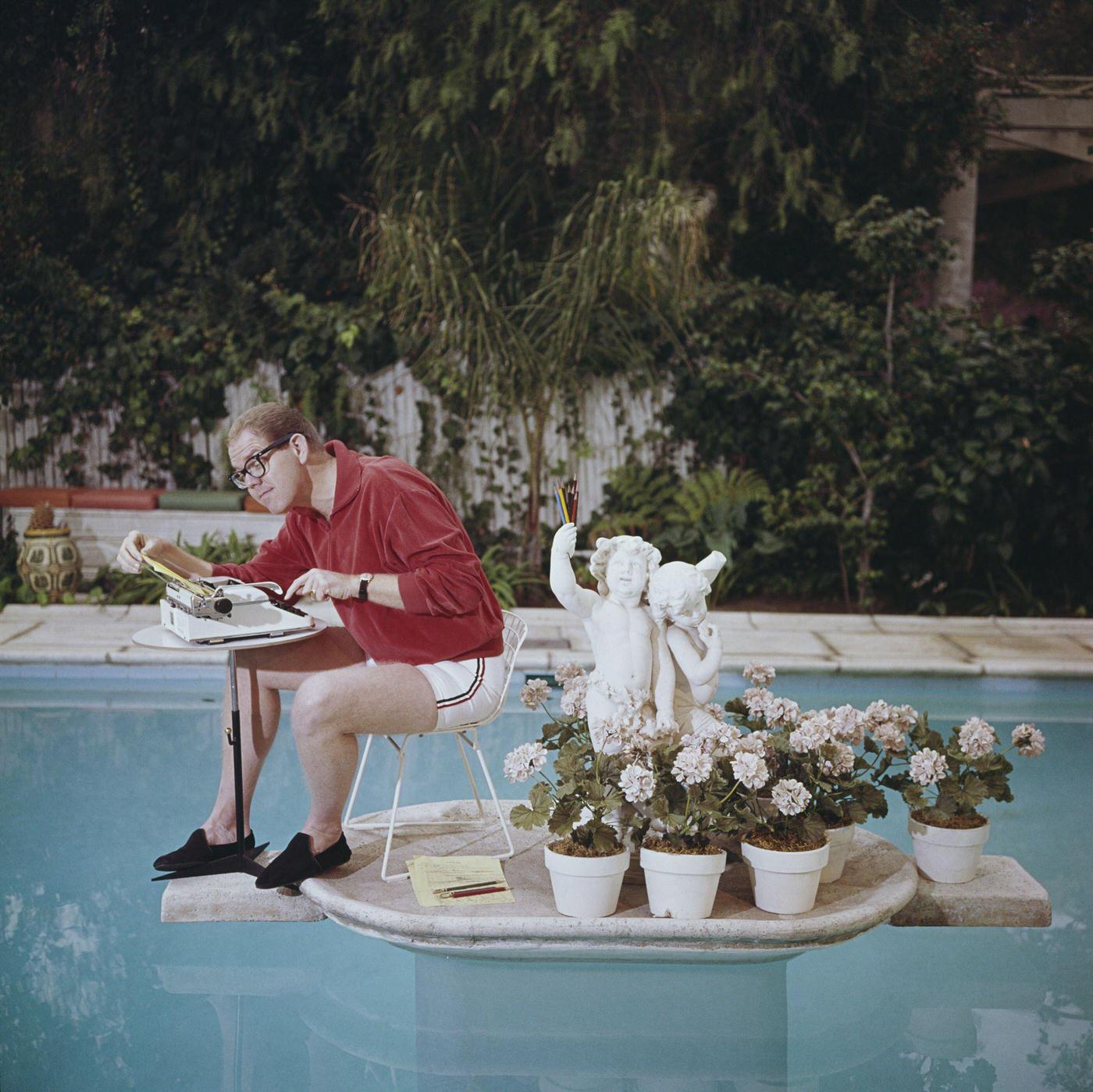 #74 Stan Freberg, working in his swimming pool.