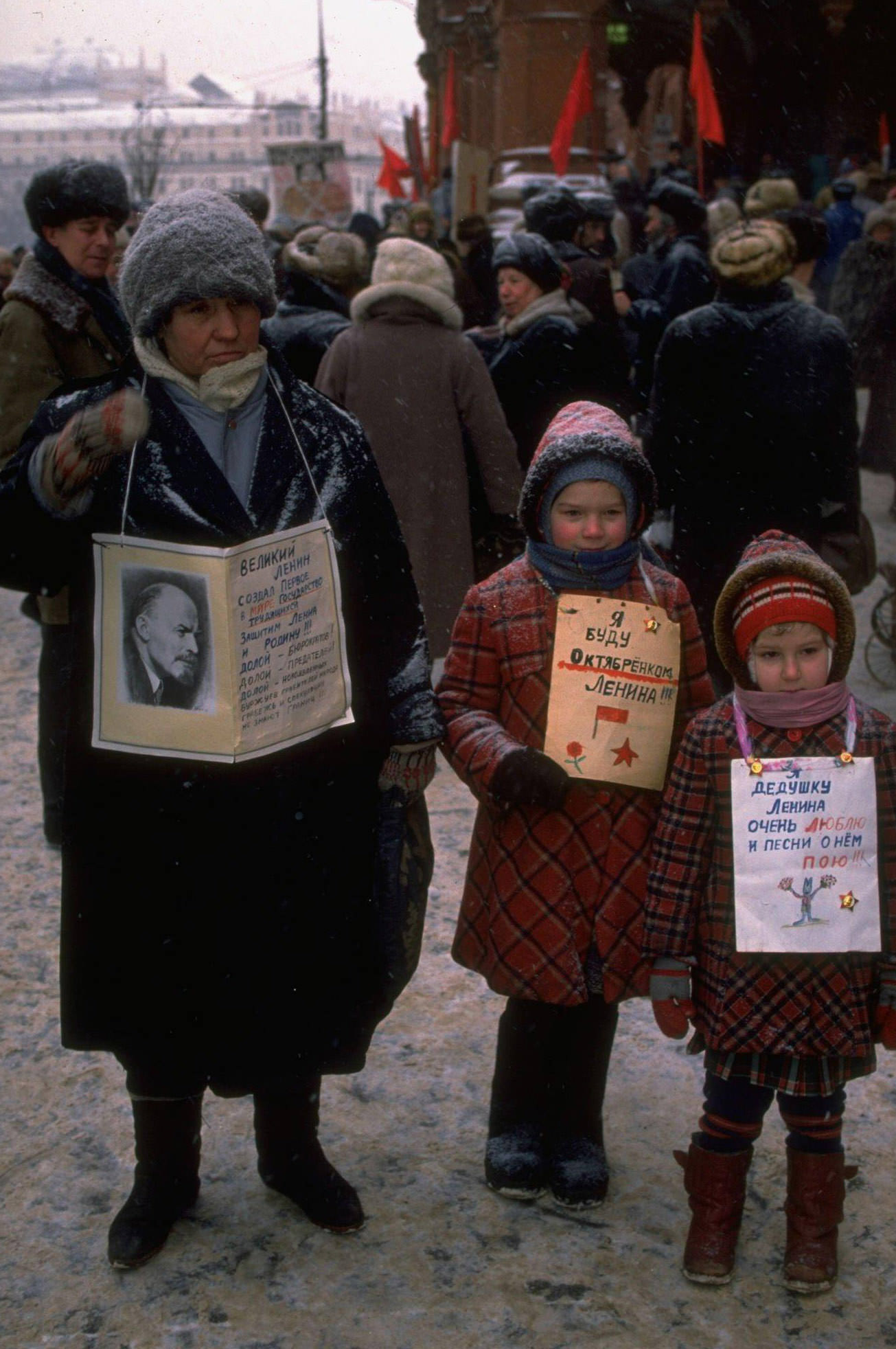 #11 Little girls and woman carrying Lenin picture among diehard demonstrators protesting for return of USSR and Communist Party by Lenin Museum.