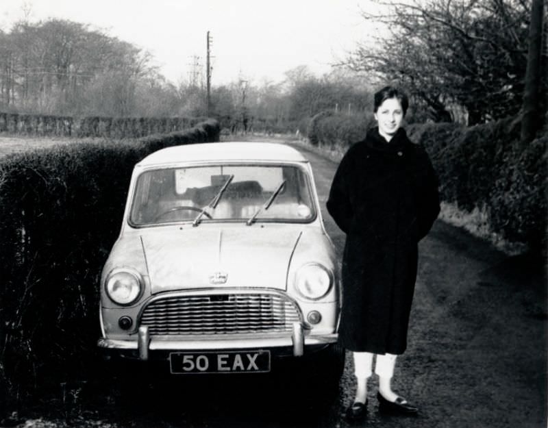 Austin Mini in a typical English country lane on a sunny winter’s day, December 1962.
