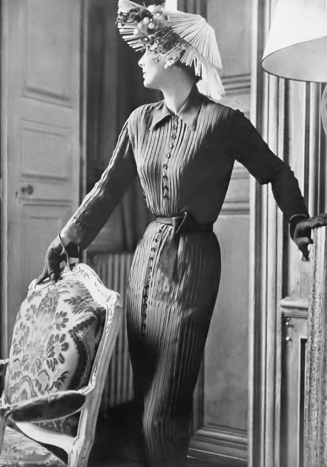 #12 Barbara Goalen in shirtdress of bright navy chiffon with the pleats stitched down by Christian Dior, 1950.