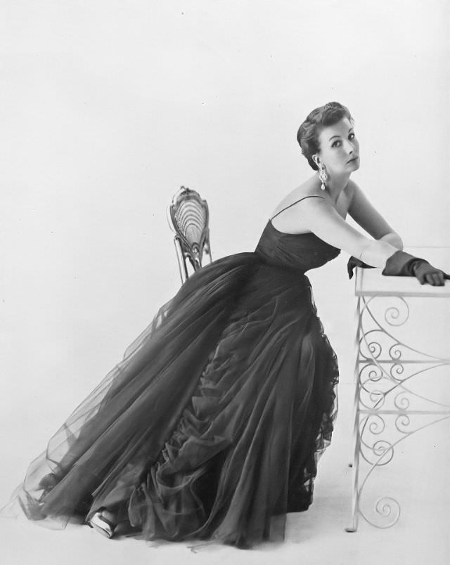 #5 Barbara Goalen in evening dress by Susan Small, 1950.