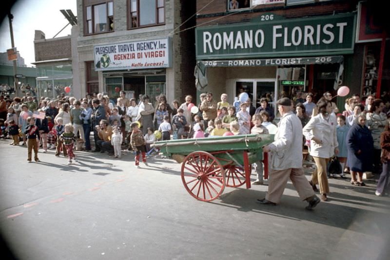 #24 Spectators lining parade route, Columbus Day parade, Boston, Massachusetts, 1971