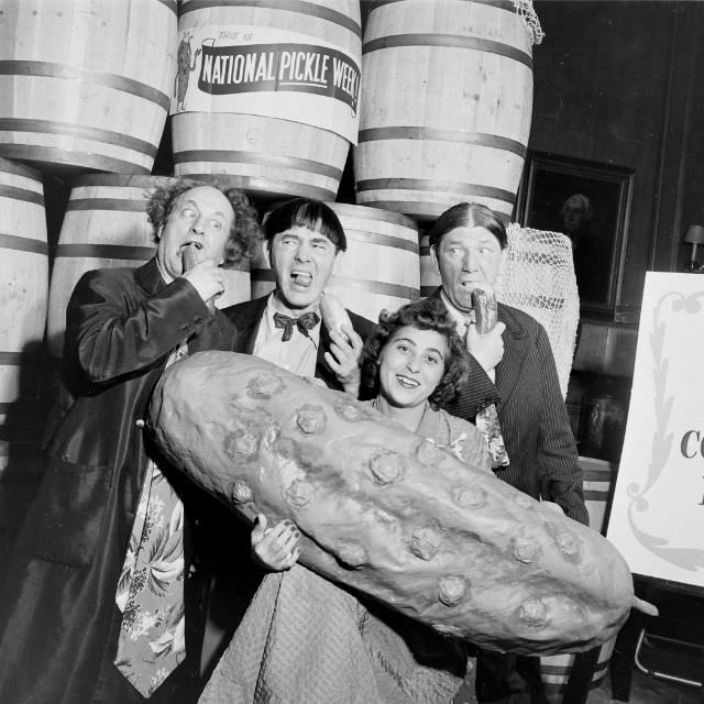 #10 The Pickle Queen posed with the Three Stooges during National Pickle Week, 1949.
