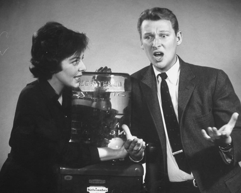 #22 Mike Nichols and Elaine May doing skit on recent TV scandals during “Fabulous Fifties” TV special, 1960.