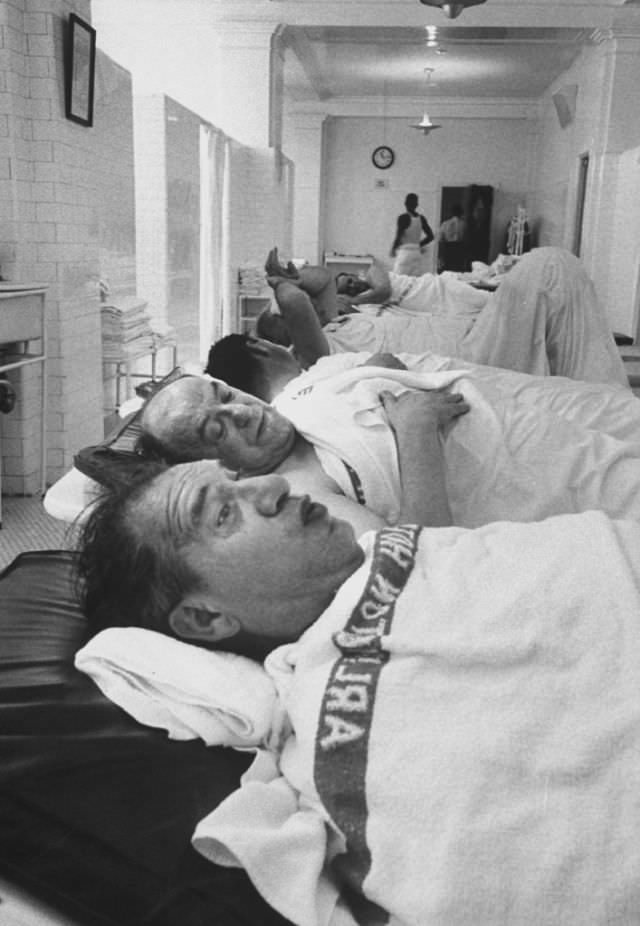 #32 Henry Youngman drying out after steam bath in Hot Springs, Arkansas, 1960.