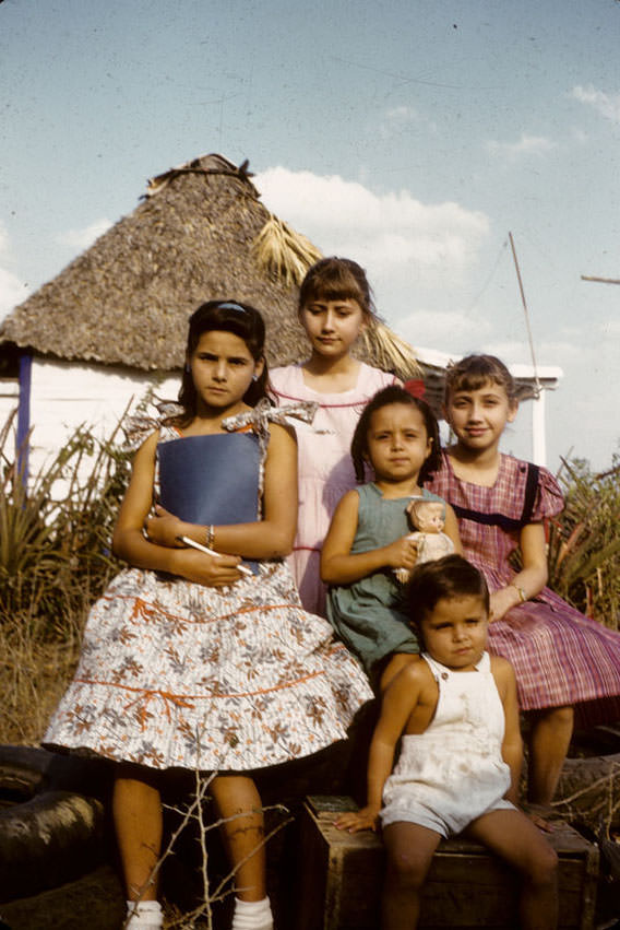 #2 Cuban children seated outdoors