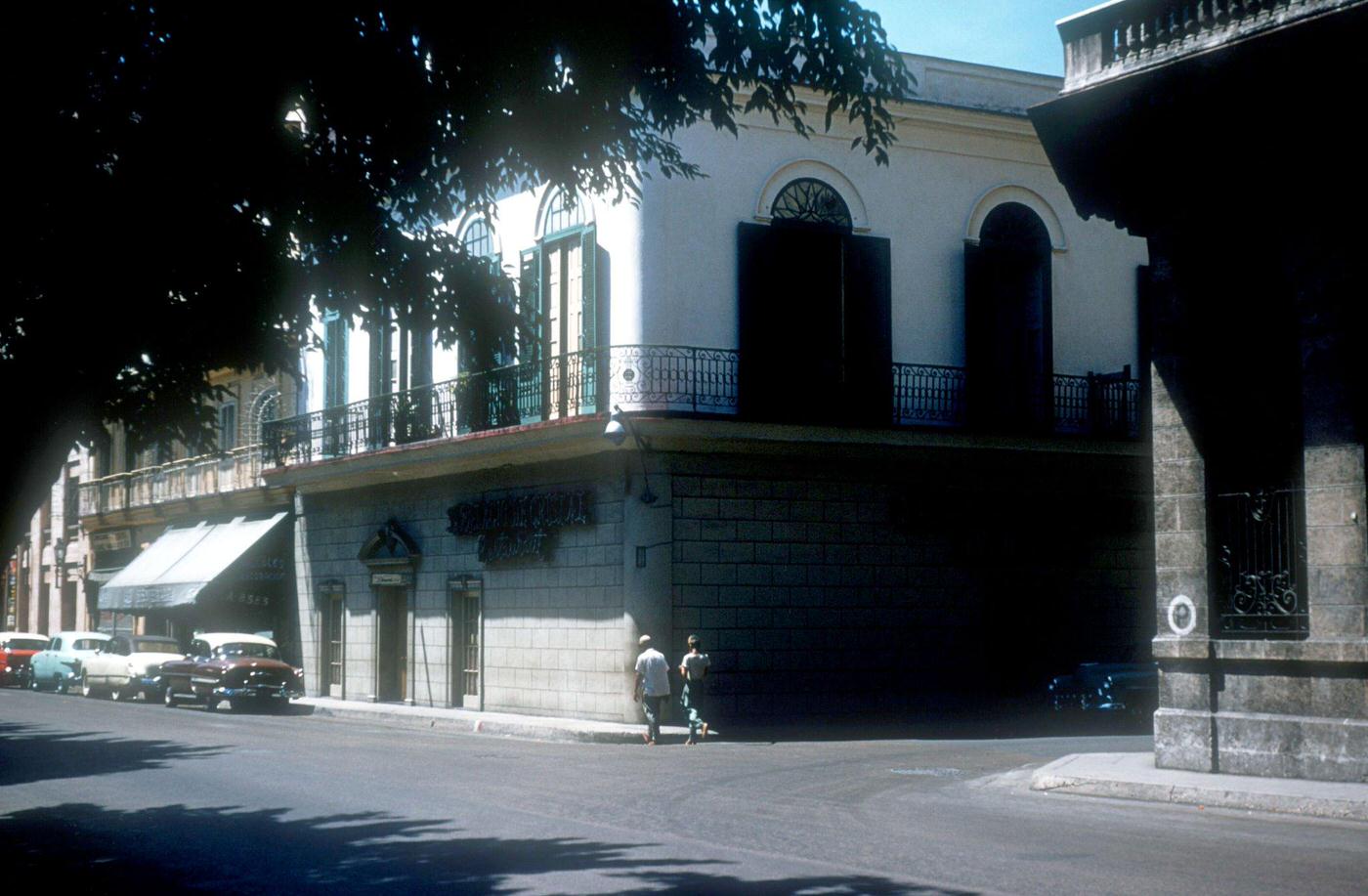#47 People walking along the streets of Havana, Cuba, 1950s.