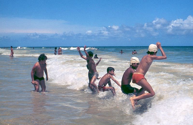 #20 Boys playing in the waves on a beach, Cuba, 1976
