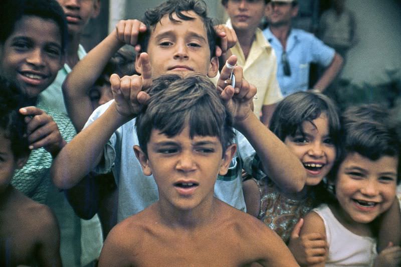 #23 Children having fun in front of the camera, Cuba, 1976