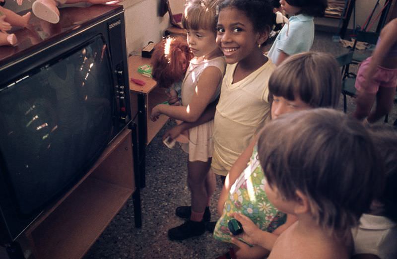 #24 Children in a kindergarten in front of TV, Cuba, 1976