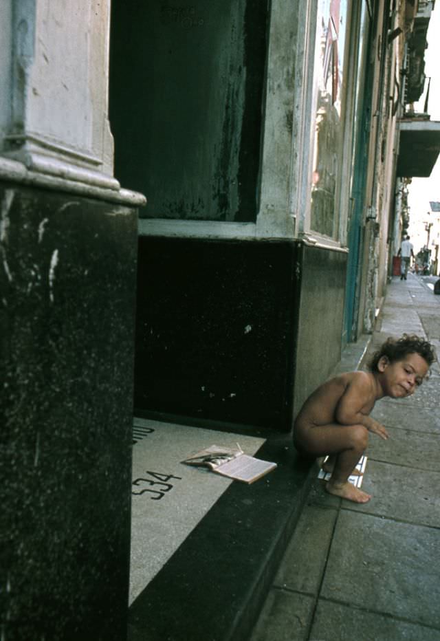 #34 Little girl at the entrance to her home, Cuba, 1976