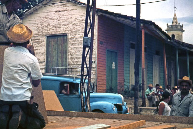 #36 Man with a straw hat and a blue truck, Cuba, 1976