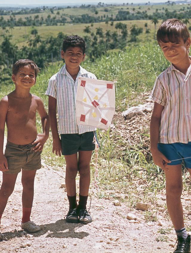 #44 Three boys with a kite, Cuba, 1976