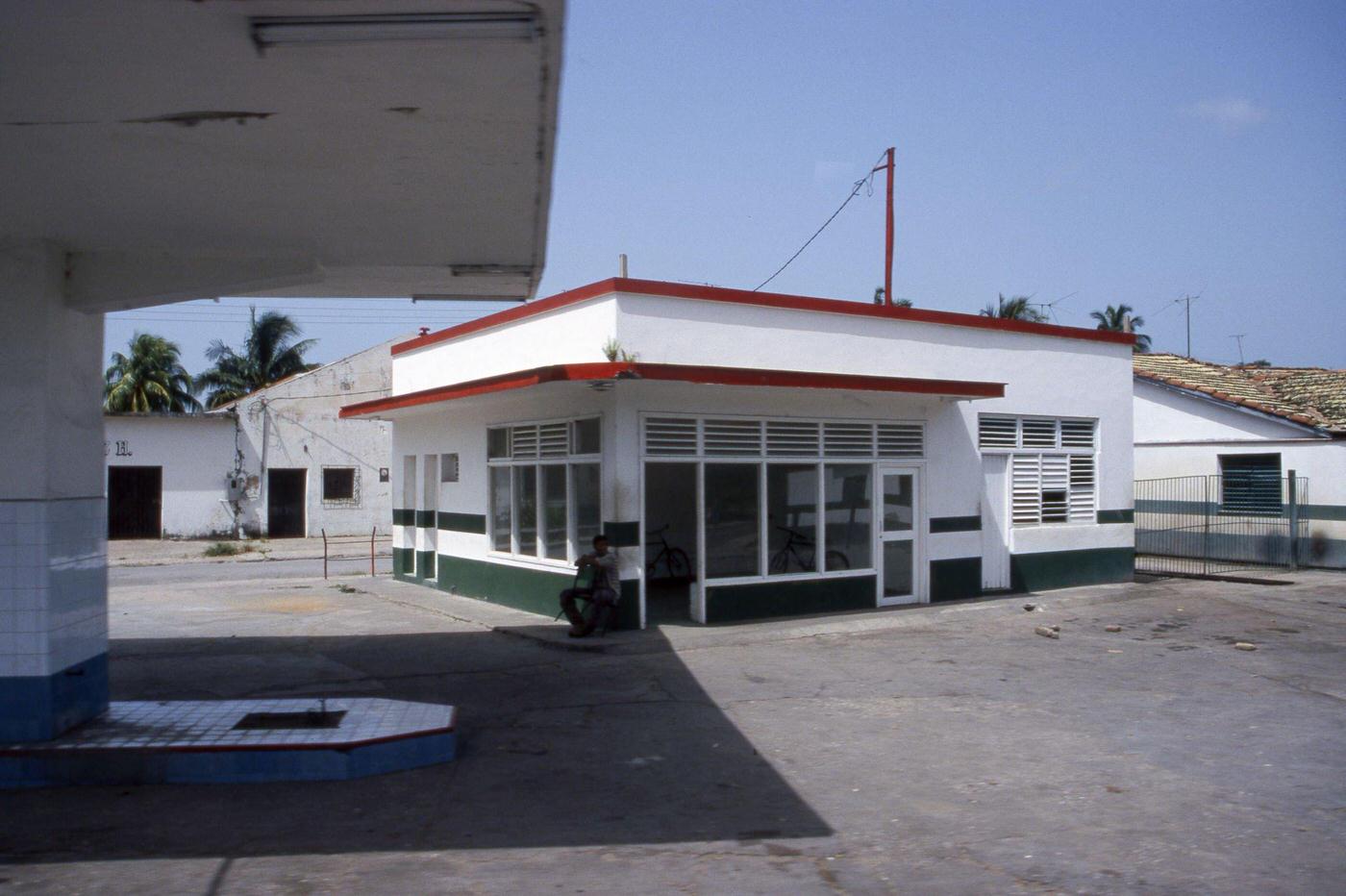 #118 Abandoned gas station and a man in Matanzas, Cuba, June 1999.