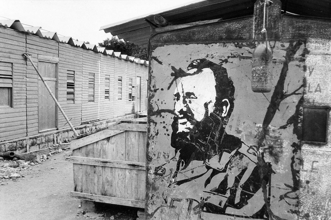 #77 Abandoned portrait of Fidel Castro on a construction site in Varadero, Cuba, 1994.