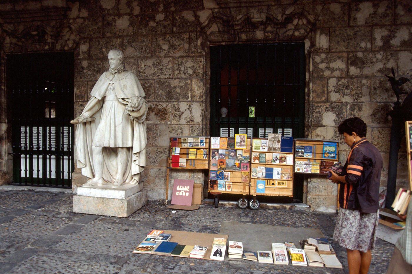 #32 Cuban woman selling second-hand books in Havana, Cuba, 1990.
