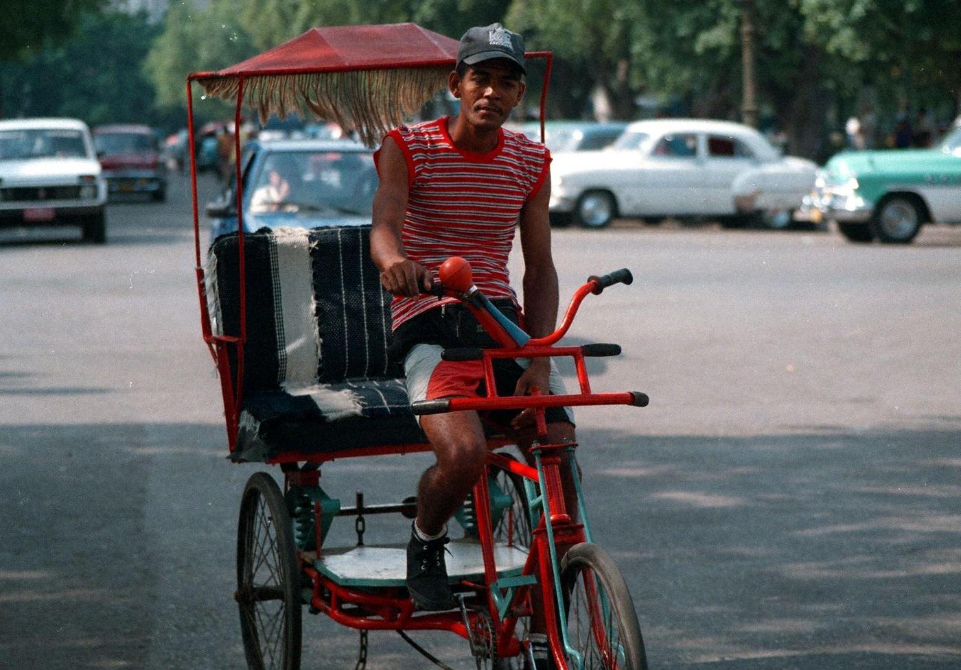 #98 Local on a bicycle rickshaw in Havana, Cuba.