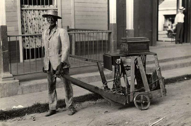 #6 Man with sewing machine, Cuba, 1933