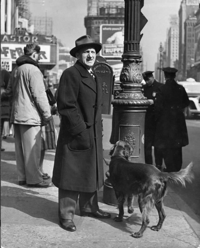 #18 Comedian Jimmy Durante walked his Irish setter in Times Square, 1944.