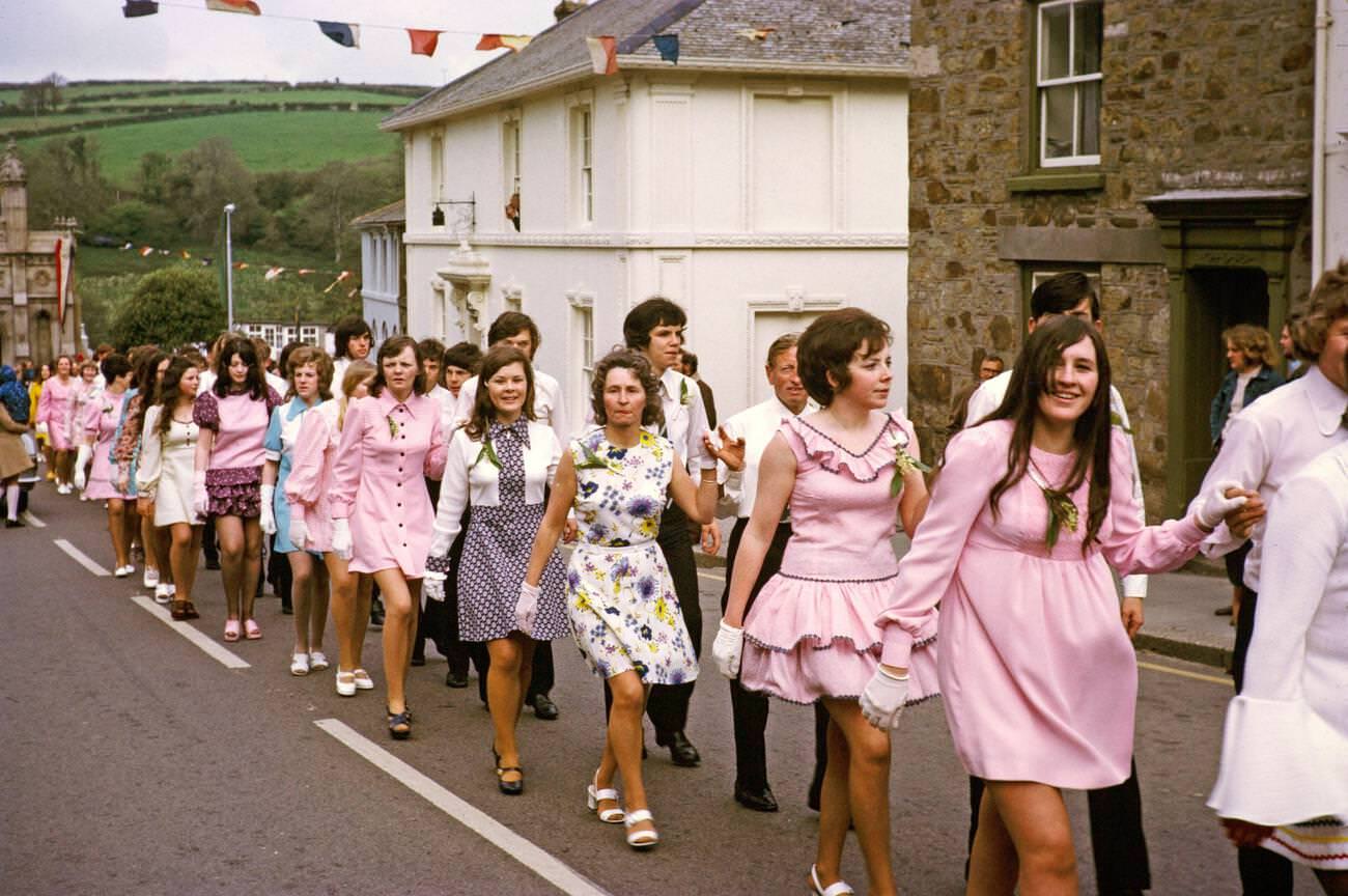 #14 Couples walk hand in hand in procession for the Evening Dance, Flora Day