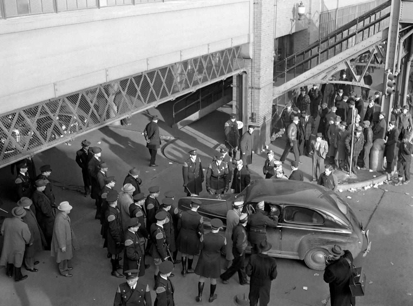 #1 A group of the Michigan state police keep the peace during the Ford Motor Company Labor Strike at the Ford River Rouge complex in Dearborn, Michigan, April 1941.