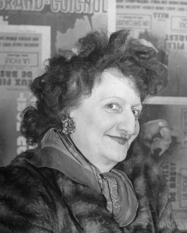 #26 Actress Renee Gardes, wearing a fur coat, performs in productions at the Grand Guignol Theater.