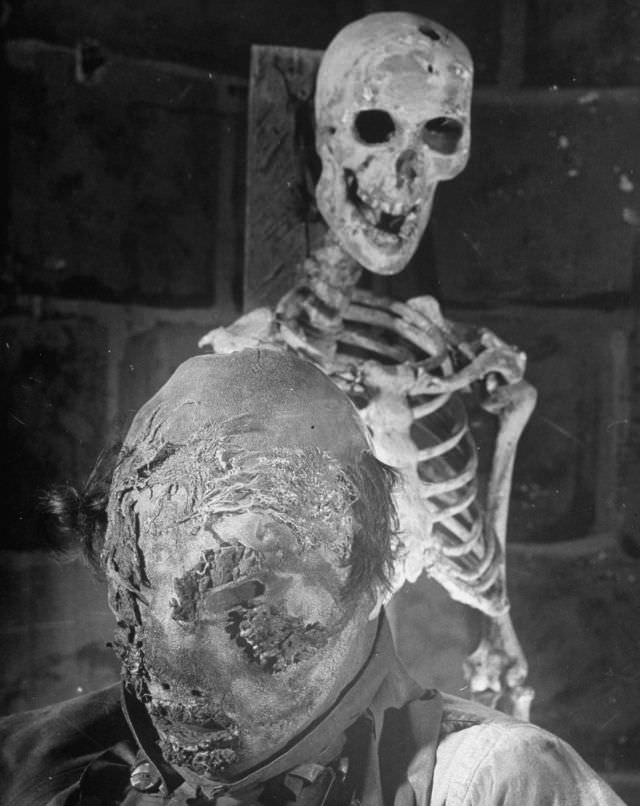 #6 Skeletons left over from the acid vat victims, appearing in production at the Grand Guignol Theater.