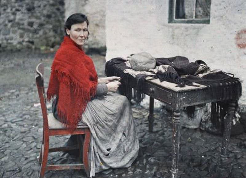 #7 Hardworking mother of seven skillfully making fringes for a knitted shawl in Galway, 29 May 1913