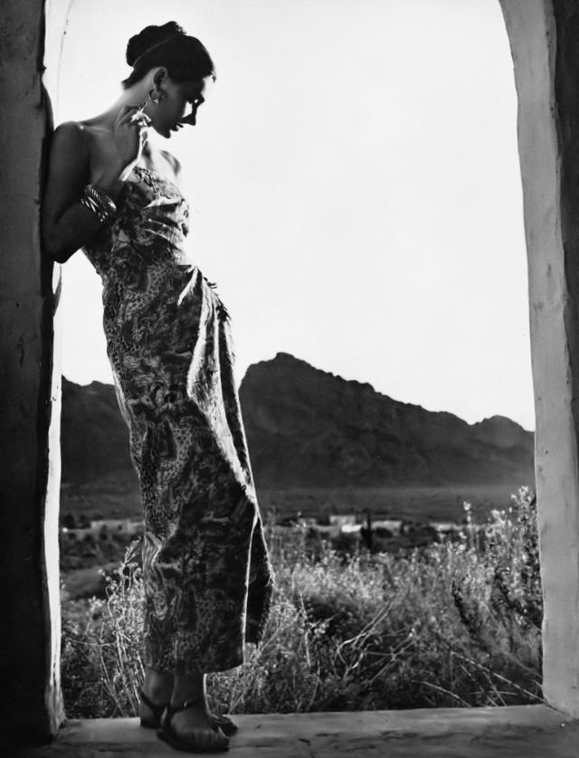 Marilyn Ambrose in dinner sarong in tangled white, black and cocoa brown cotton piqué by Hope Skillman, Camelback Mountain, Arizona, Vogue, 1945.