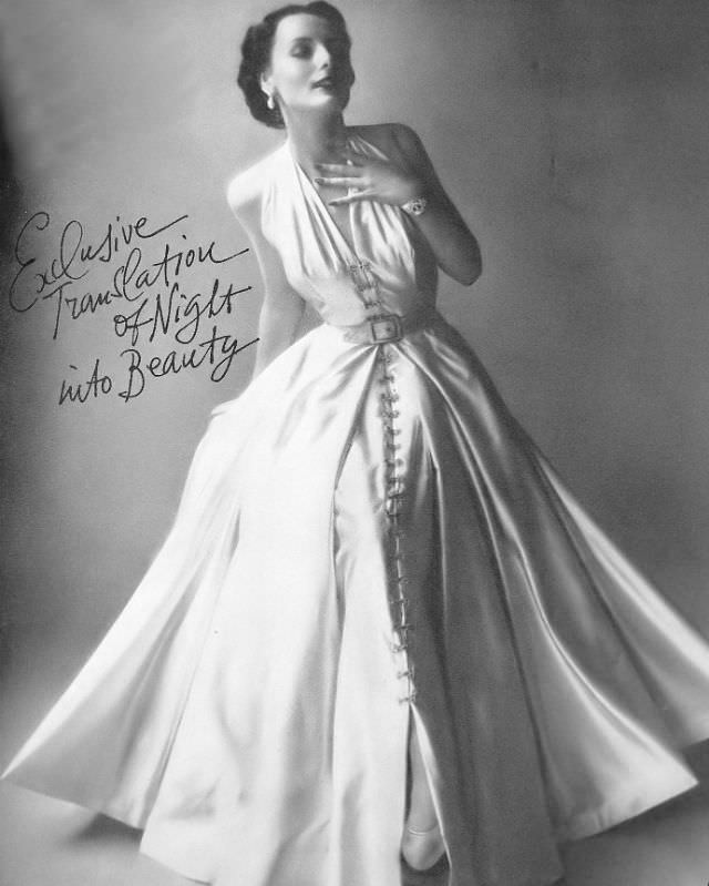 #30 Lucille Lewis in beautiful silk-satin gown with billowing skirt exclusively at Bergdorf Goodman, Harper’s Bazaar, 1948.