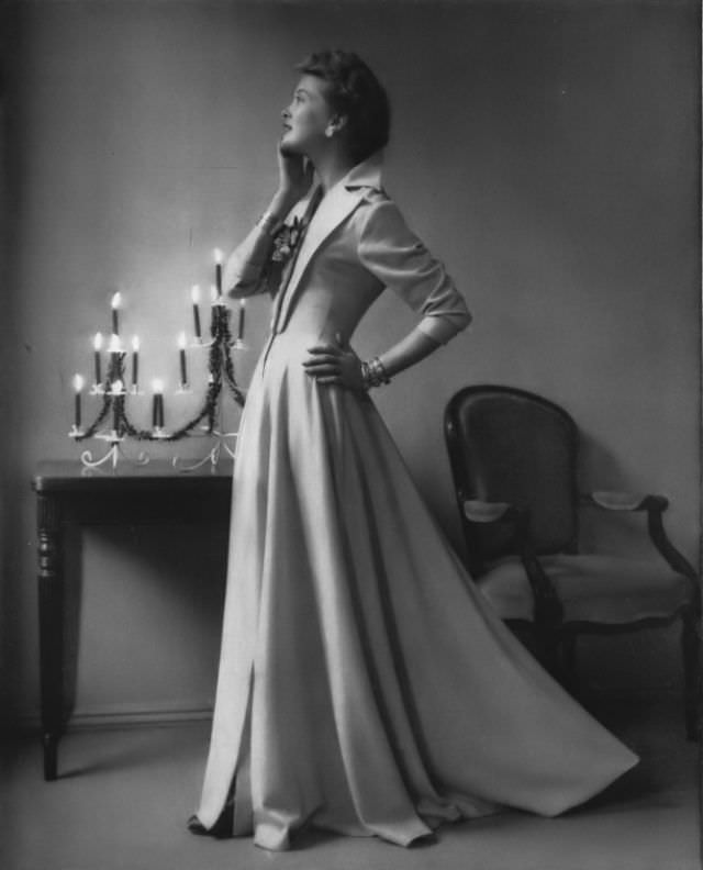#38 Model in lovely homecoat of thin wool flannel from Bergdorf Goodman, Vogue, 1948.