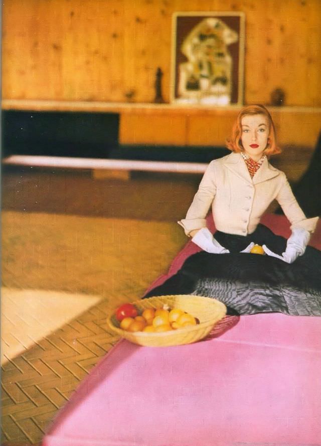 #18 Liz Pringle in black moiré full skirt with tight-short fleece jacket from Lord & Taylor, March 1952