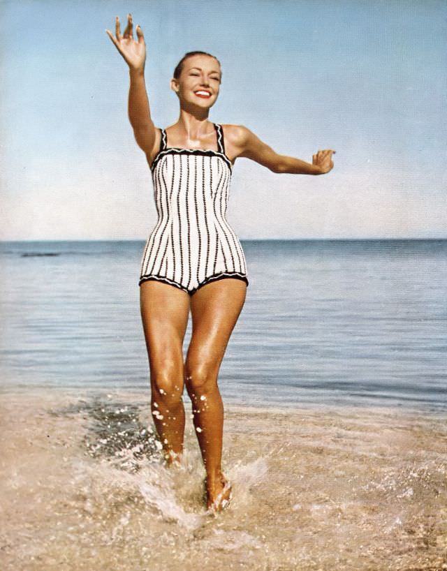 #42 Liz Pringle in black and white striped maillot by Jantzen, 1956