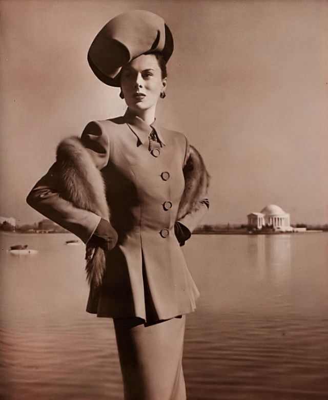#11 Meg Mundy in beautifully tailored suit by Philip Mangone, Vogue, march 15, 1946