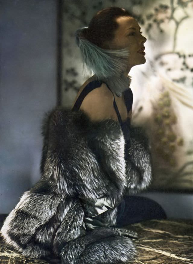 #28 Meg Mundy in luxurious long-hair silver fox fur designed by Sophie of Saks Fifth Avenue, Vogue, May 1, 1947