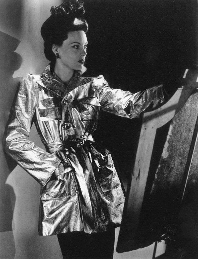 #3 Meg Mundy in a 22-carat gold-washed kid trench coat by Mainbocher, Vogue, September 15, 1940